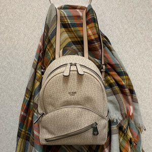 New Guess taupe backpack.
